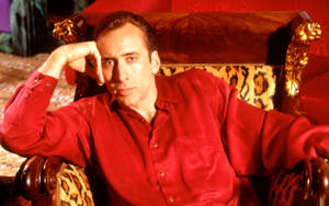 Nicolas Cage Photoshoot Red Background Wallpaper