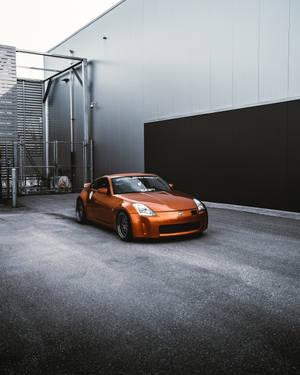 Nissan 350z In Orange Wallpaper