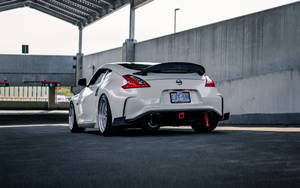 Nissan 370z At A Covered Parking Wallpaper