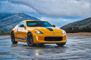 Nissan 370z With A Black-striped Hood Wallpaper