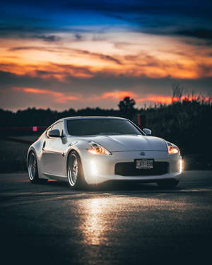 Nissan 370z With Orange Skies Wallpaper