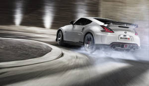 Nissan 370z With Smoking Wheels Wallpaper