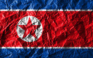 North Korea Flag Crumpled Design Wallpaper