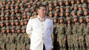North Korea Leader White Suit Wallpaper