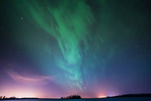 Northern Lights Glowing Dawn Sky Wallpaper