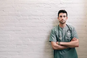 Nursing Leaning On The Wall Wallpaper