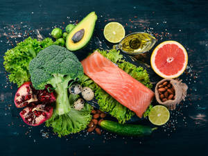 Nutritious Meal With Broccoli And Pink Salmon Wallpaper