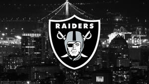 Oakland Raiders Logo On City Buildings Wallpaper