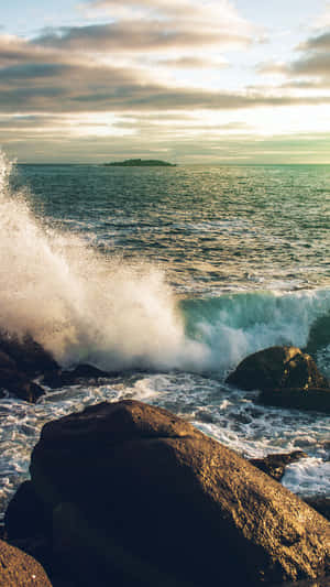 Ocean Wave During Golden Hour Iphone Wallpaper