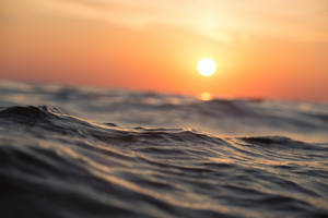 Ocean Waves During Sunset Screensavers Wallpaper