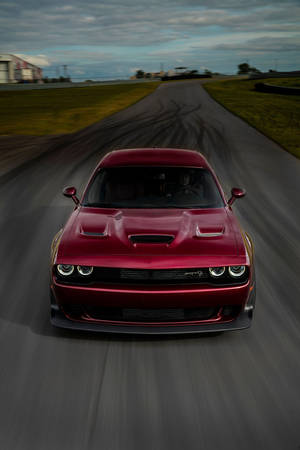 Octane Red Dodge Challenger Demon Isolated On Track Wallpaper