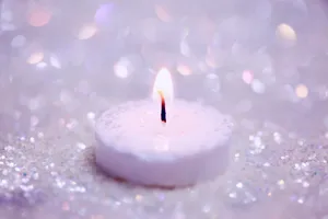 Off White Glitters Candle Wallpaper
