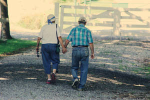Old Couple Holding Hands Wallpaper