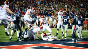 Ole Miss Stadium With Players Wallpaper