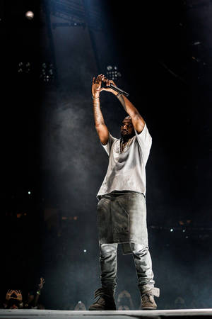 On-stage Hands Up Kanye West Android Wallpaper