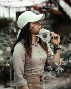 One Woman Wearing Piece Of Mask Wallpaper