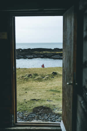 Open Door To Seaside Cliff Wallpaper