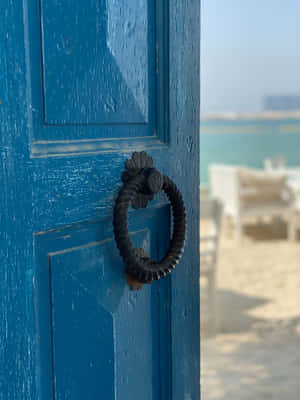 Open Door With Knocker Wallpaper