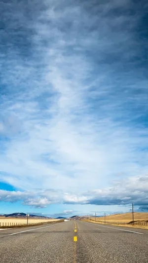 Open Road Under Expansive Sky Wallpaper