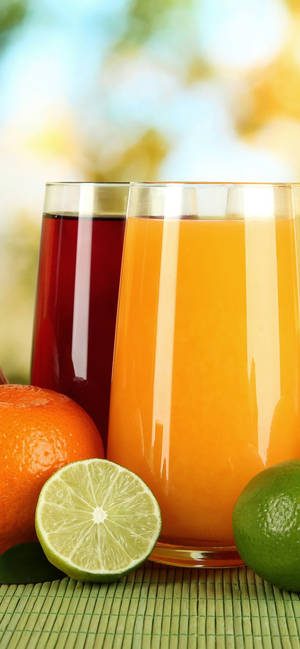 Orange And Lime Fruit Juices Wallpaper