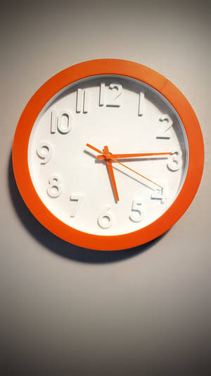 Orange Clock White Numbers Wallpaper