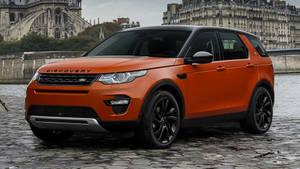 Orange Discovery Land Rover Iphone Wallpaper