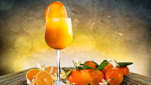Orange Fruit In A Glass Wallpaper