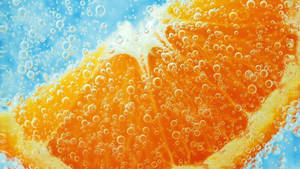 Orange Fruit With Bubbles Wallpaper