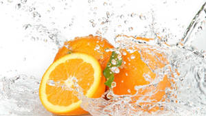 Orange Fruits In Water Wallpaper