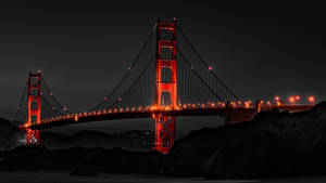 Orange Lights Illuminating Golden Gate Bridge Wallpaper