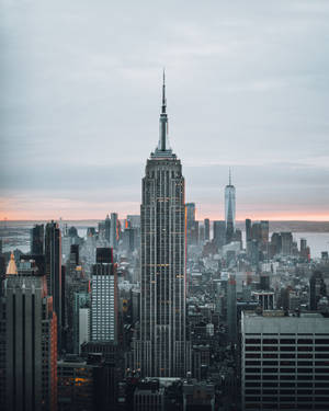 Orange Sunset Behind The Empire State Building Wallpaper