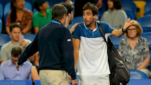 Pablo Cuevas In Action Against Nikoloz Basilashvili Wallpaper