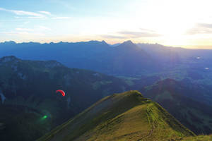 Paragliding Sunrise Alps Wallpaper