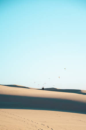 Paragliding Watching On Dune Wallpaper