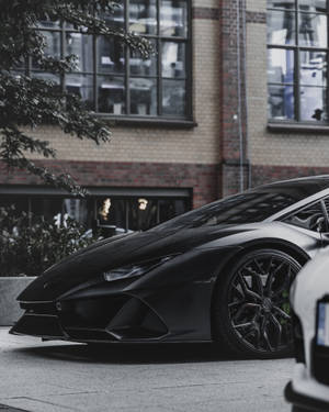 Parked Black Lamborghini Galaxy Wallpaper