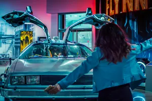 Parked Delorean Retrowave Car Wallpaper