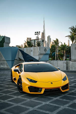 Parked Yellow Lamborghini Galaxy Wallpaper