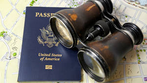 Passport With Old Binoculars Wallpaper