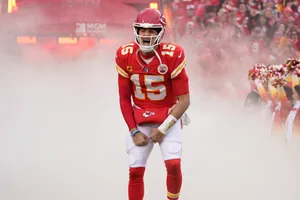 Pat Mahomes Holds His New Smartphone Wallpaper