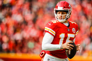 Patrick Mahomes Taking A Break From Football To Take A Call On His Phone. Wallpaper