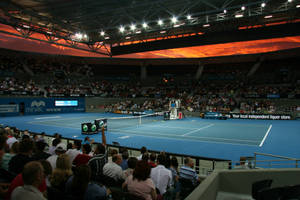 Patrick Rafter Showcasing His Skills In A Tennis Arena. Wallpaper