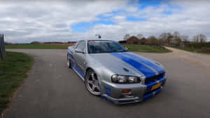 Paul Walker Drifts Through Downtown In A Nissan Skyline. Wallpaper