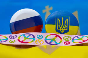Peace Symbol With Russia And Ukraine Flags Wallpaper