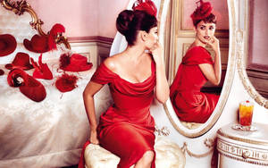 Penelope Cruz Reflecting Elegance In The Mirror Wallpaper