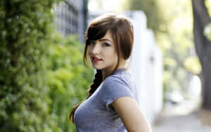 Pensive Adolescent Girl In Nature Wallpaper