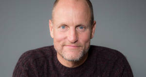 Pensive Woody Harrelson - Renowned American Actor Wallpaper