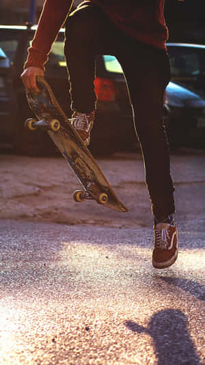 Person Doing Tricks Retro Skateboard Wallpaper