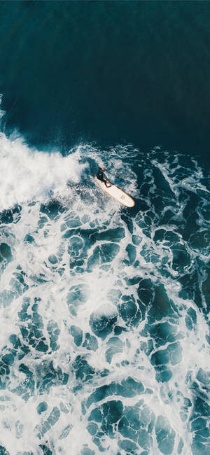 Person Surfing On Waves Iphone 2021 Wallpaper