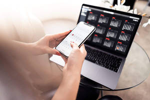 Person Working With Macbook Air 2020 Wallpaper