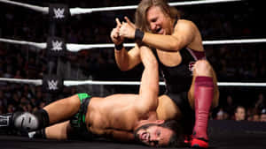 Pete Dunne Submission Against Johnny Gargano Wallpaper